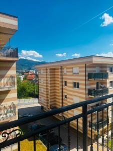 a view of a building from a balcony at Apartman Lala in Sarajevo