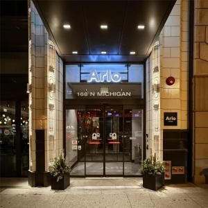 a store front of a building with a sign on it at Arlo Chicago in Chicago