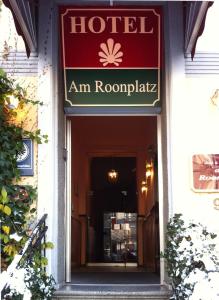 a sign that reads hotel am rapapa above a doorway at Hotel Am Roonplatz in Bonn