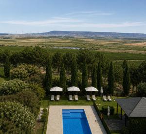 an aerial view of a villa with a swimming pool at Hotel Pago De Cirsus in Ablitas