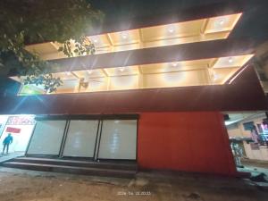 a building with a bunch of windows on it at Hotel Madhur Palace in Bhopal +9 photos
