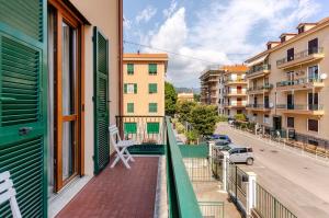 a balcony with a view of a street at Apartment Superiore a 950 metri dal mare in Albisola Superiore