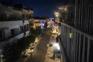 an empty city street at night with buildings at Twin Bed Room-King Room Zona Colonial in Santo Domingo