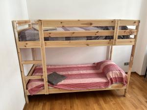 a set of bunk beds in a room at movida beach in Bari