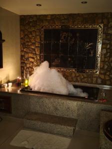 a pile of dust on a counter in a bathroom at Arraial do Cabo - Suite master in Arraial do Cabo