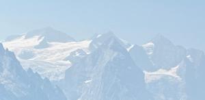 a view of a snow covered mountain range at Ferienwohnung Rosenlaui in Meiringen