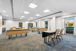 a classroom with tables and chairs in a room at Hampton Inn & Suites By Hilton Knightdale Raleigh in Raleigh +25 photos