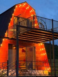 a staircase on a house with lights on it at Alpase Resort in Didi Khalebi