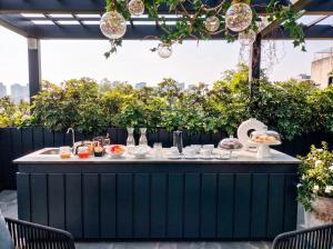 a breakfast buffet on the roof of a building at Leonora by Viadora in Mexico City
