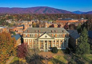 an aerial view of a large mansion in a city at avid hotels - Salem by IHG in Salem