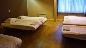 Postel nebo postele na pokoji v ubytování Ambassador Suites Antwerp
