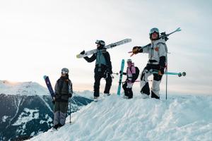 a group of people standing on top of a snow covered mountain at Cabane Bella-Tola in Saint-Luc