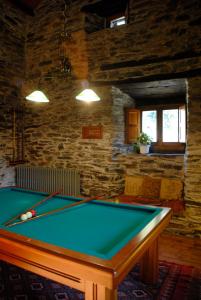 a billiard table in a room with at Casa Grande da Ferreria de Rugando in Rugando