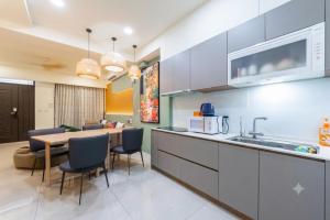 a kitchen and dining room with a table and chairs at 原森民宿B&b包棟最佳選擇 in Wujie +28 photos