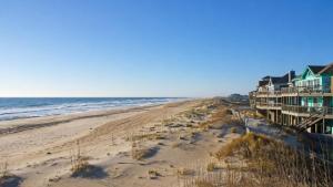 a view of a beach with houses and the ocean at Rio Rodanthe Lazy River Kiddie Pool Oceanfront Elevator in Rodanthe