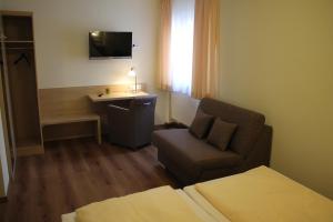 TV a/nebo společenská místnost v ubytování Hotel-Restaurant Stern