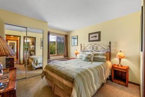 a bedroom with a large bed and a mirror at Indian in Clark +21 photos