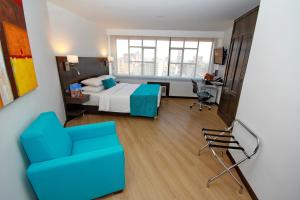 Postelja oz. postelje v sobi nastanitve Hotel Dann Cali