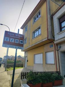 a for sale sign in front of a building at MarinaMar Camariñas in Camariñas