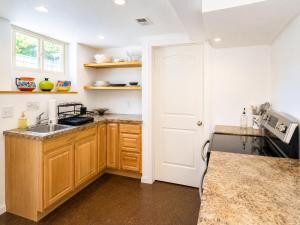 a kitchen with a sink and a counter top at The Nest in Fort Collins
