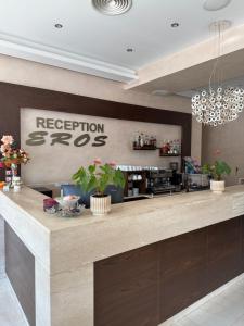 a bar in a restaurant with a reception desk at Motel Eros in Sandanski