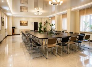 a large conference room with a large table and chairs at Vila LOLO in Chişinău +45 photos