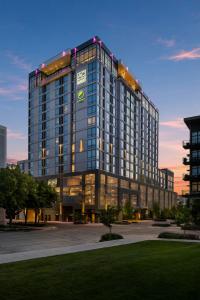 a large glass building with lights on top of it at Element by Marriott Boise Downtown in Boise