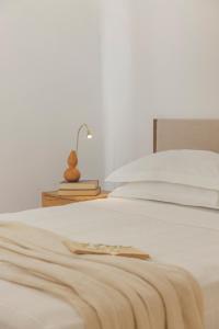 a close up of a bed with at Ithaca Garden Villa, Kioni in Kiónion