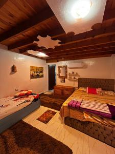 a bedroom with two beds in a room at Salah boutique camp in Nuweiba