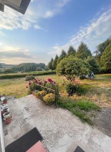 a garden with flowers and plants in a field at Casa Vila in Pol