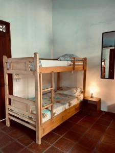 a couple of bunk beds in a room at HOTEL CASA BRESSE in Cali