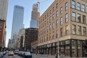 a tall building on a city street with cars at Duane Street Hotel Tribeca, Belvilla District 6 Formerly Sonder in New York
