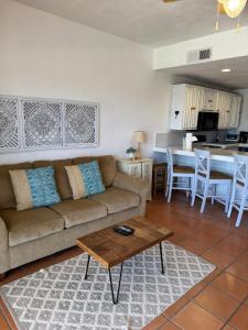 a living room with a couch and a table at Paradise Villa #5 in Puerto Peñasco