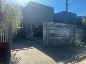 a building with a gate in front of it at Residential Florence Nightingale in Sorriso