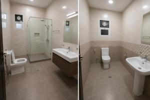 a bathroom with a sink and a toilet and a shower at EZ Homes in Abu Dhabi