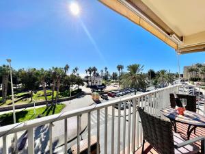 a balcony with a view of a parking lot at Apartamento El Nido in Torre del Mar