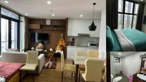 a kitchen and a living room with a table and chairs at Dalat Family Center in Da Lat