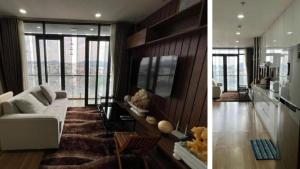 a living room with a couch and a tv at Dalat Family Center in Da Lat +12 photos