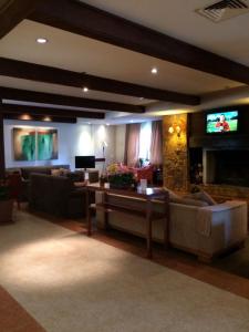 TV a/nebo společenská místnost v ubytování Flat em Gramado