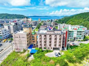 an aerial view of a city with buildings at Beach Condo Motel in Taean +9 photos