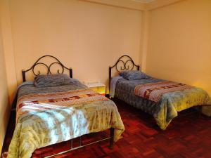 a bedroom with two beds in a room at Leo in Copacabana