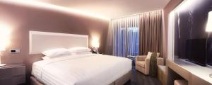 Posteľ alebo postele v izbe v ubytovaní Saz City Life Boutique Hotel