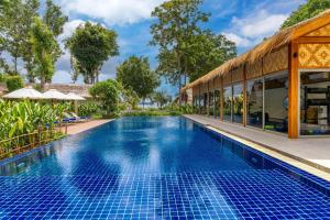 an infinity pool at a resort at OUTRIGGER Phi Phi Island Resort in Phi Phi Islands