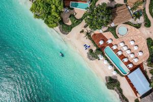 an aerial view of a resort on the beach at OUTRIGGER Phi Phi Island Resort in Phi Phi Islands +74 photos