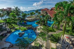 an aerial view of a pool at a resort at The Magellan Sutera Resort in Kota Kinabalu