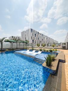 a rendering of a hotel with a swimming pool at Capitalcribs in Tatu City