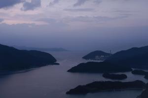 a large body of water with islands in it at 纏matoi in Maizuru