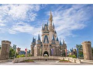 a disney castle in the middle of a city at R Hotel - Vacation STAY 19692 in Chiba