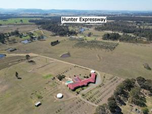 an aerial view of a large field with the words hunter engagementagency at Noble Willow Estate in Lovedale +41 photos