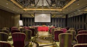 a conference room with a table and chairs and a screen at Grand Lisboa Macau in Macau +76 photos
